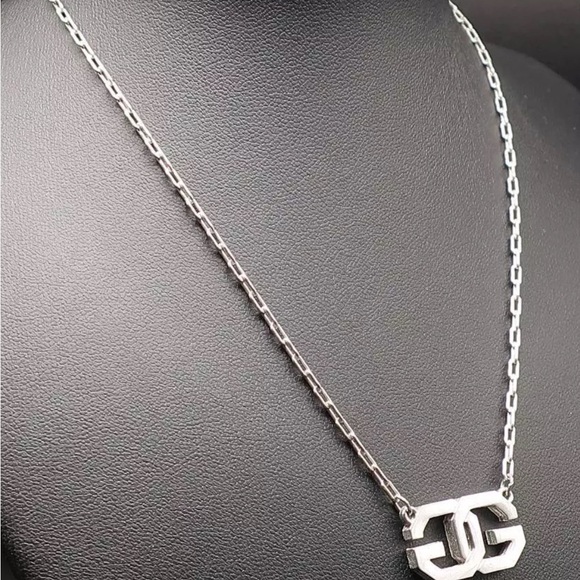 Givenchy Silver Tone Logo Pendant Necklace